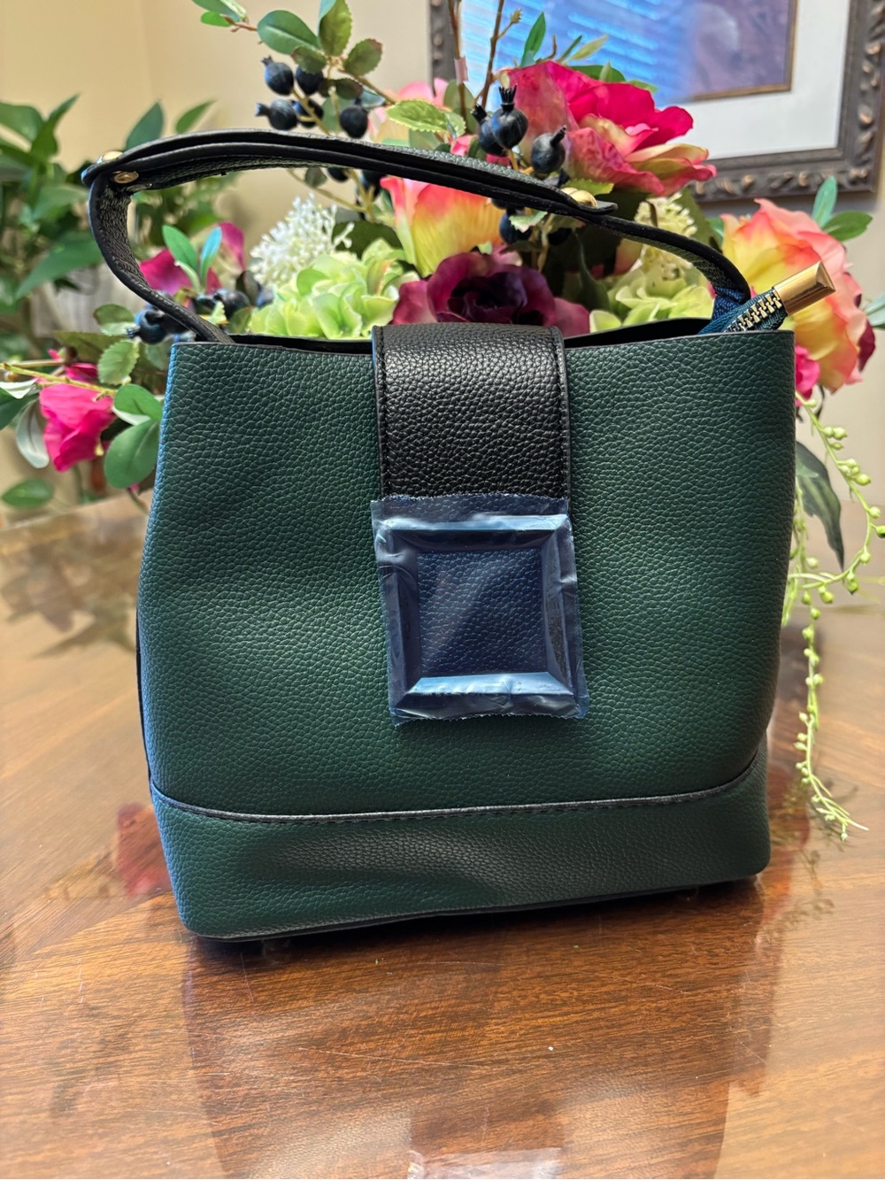 Bucket Style  Dark Green Pebbled Shoulder Bag with Black Trim